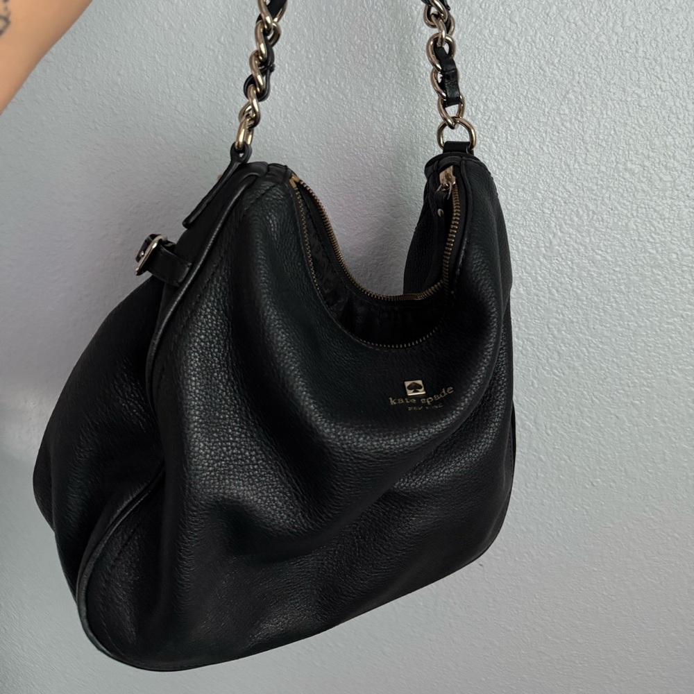 Kate Spade Pine Street Finley hobo bag in black pebbled leather.